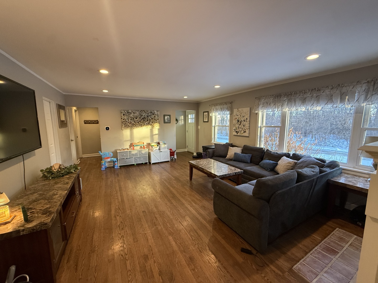 1044 Ellsworth Avenue Addison, IL 60101 - Photo 11 of 45 a living room with furniture and a flat screen tv