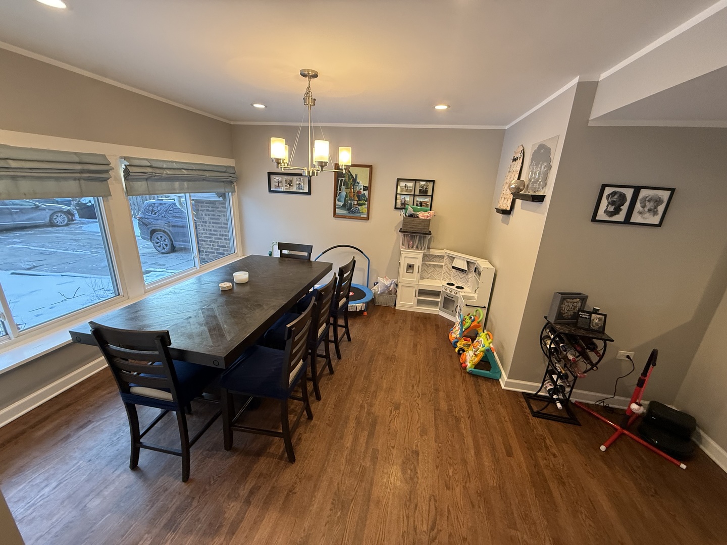 1044 Ellsworth Avenue Addison, IL 60101 - Photo 12 of 45 a view of a dining room with furniture and wooden floor
