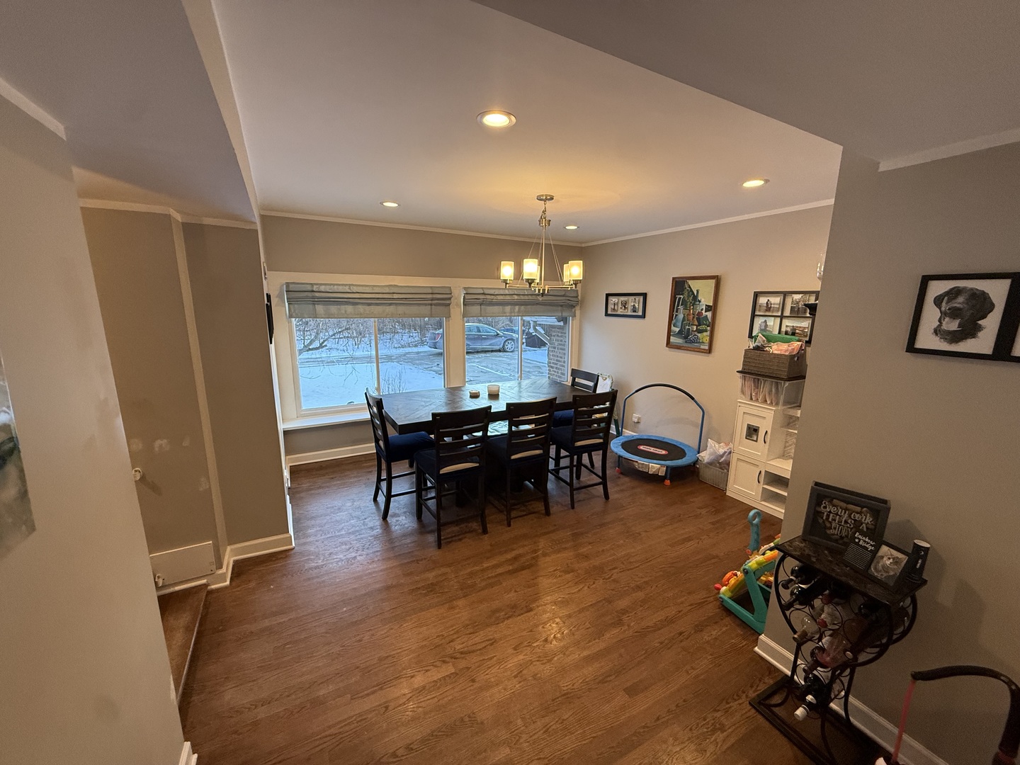 1044 Ellsworth Avenue Addison, IL 60101 - Photo 14 of 45 a view of a dining room with furniture and a chandelier