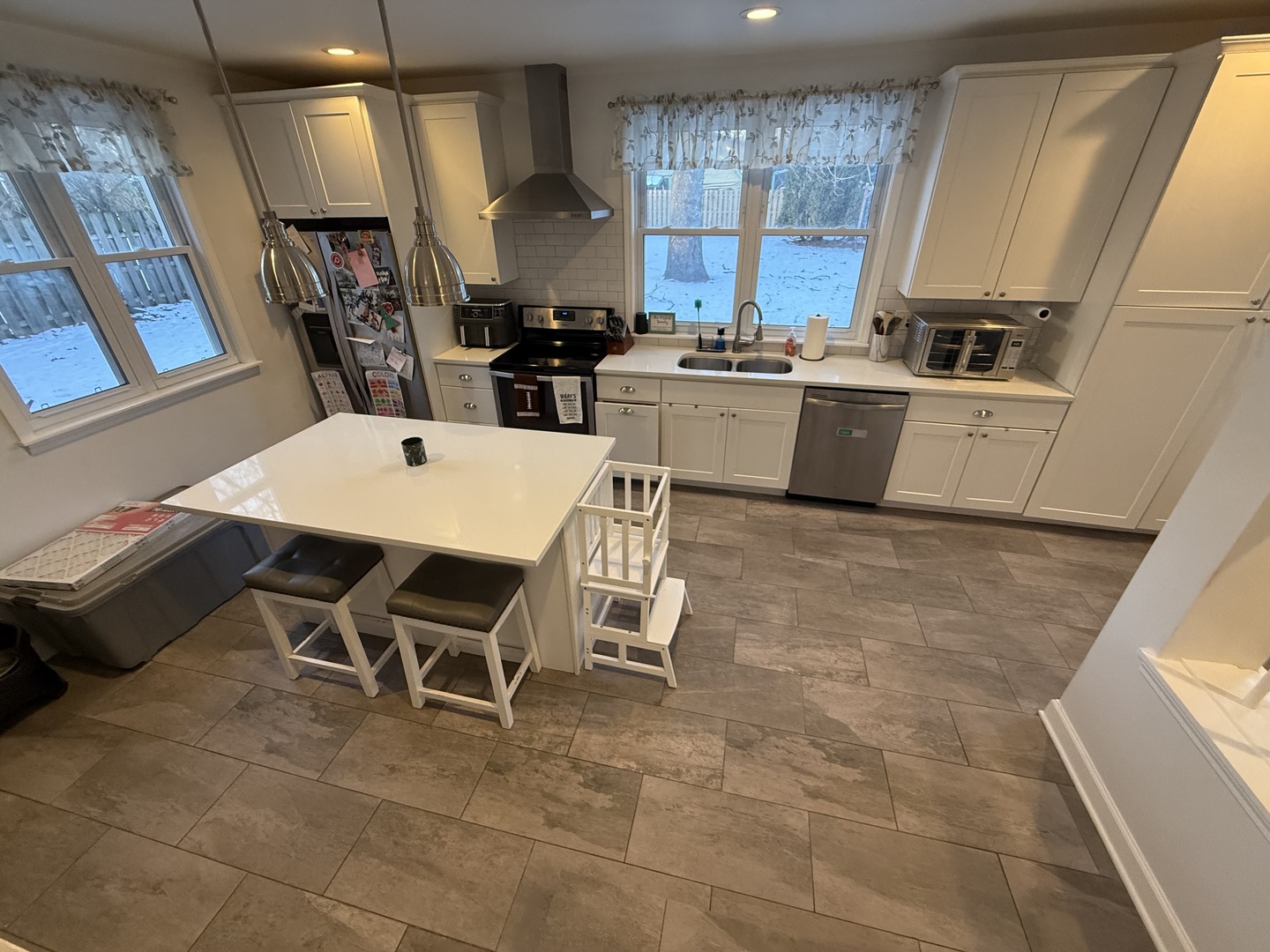 1044 Ellsworth Avenue Addison, IL 60101 - Photo 16 of 45 a view of kitchen with sink microwave and cabinets