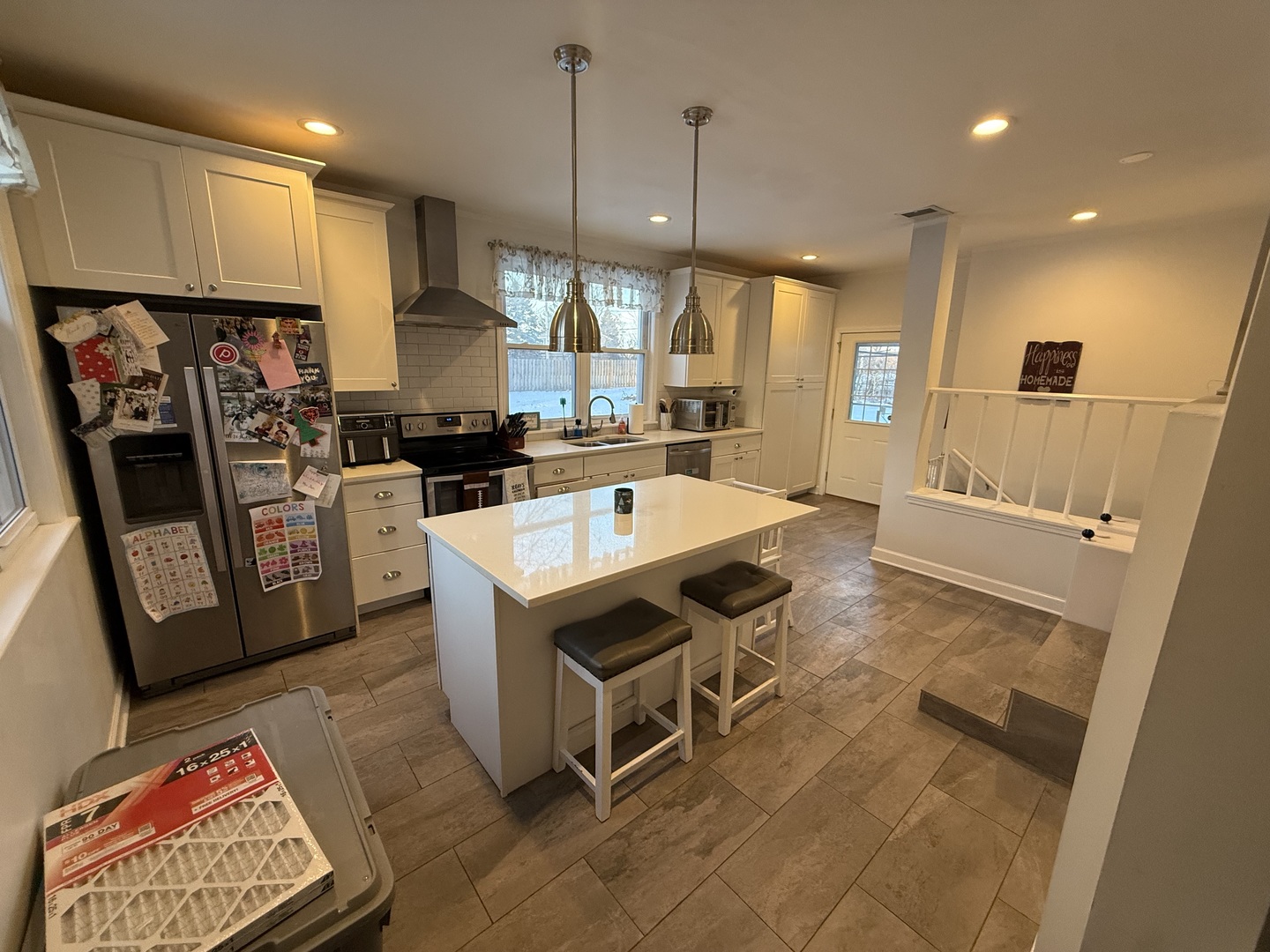 1044 Ellsworth Avenue Addison, IL 60101 - Photo 19 of 45 a kitchen with stainless steel appliances granite countertop a refrigerator a sink a stove and a cabinets