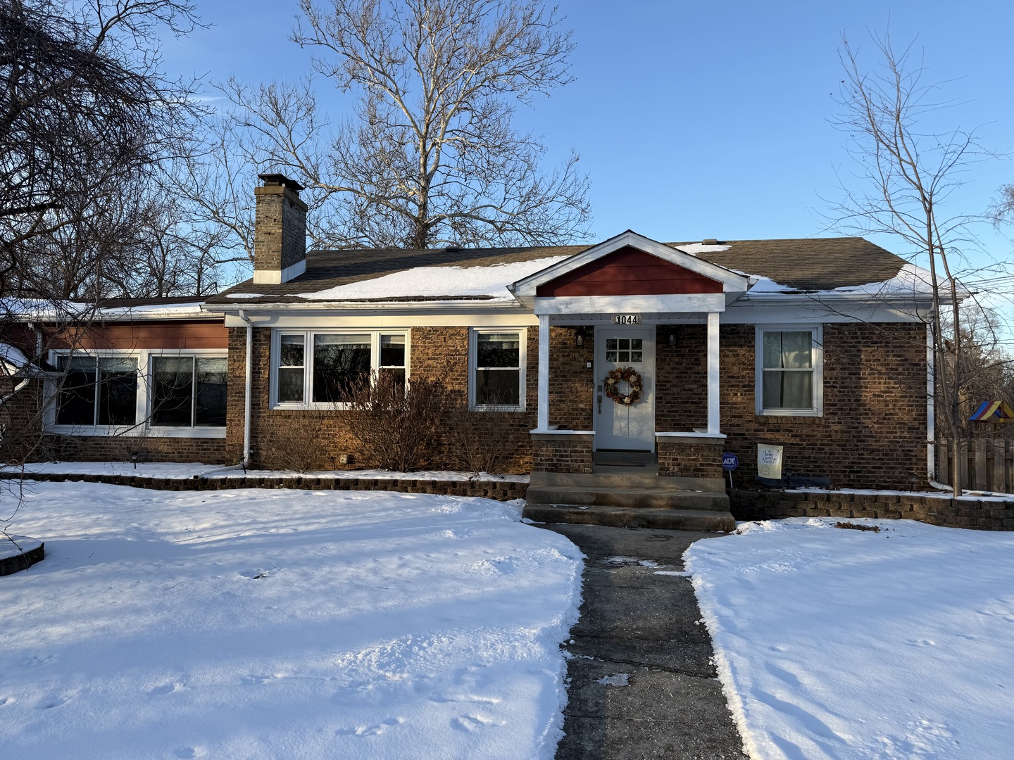 1044 Ellsworth Avenue Addison, IL 60101 - Photo 2 of 45 a front view of a house with yard