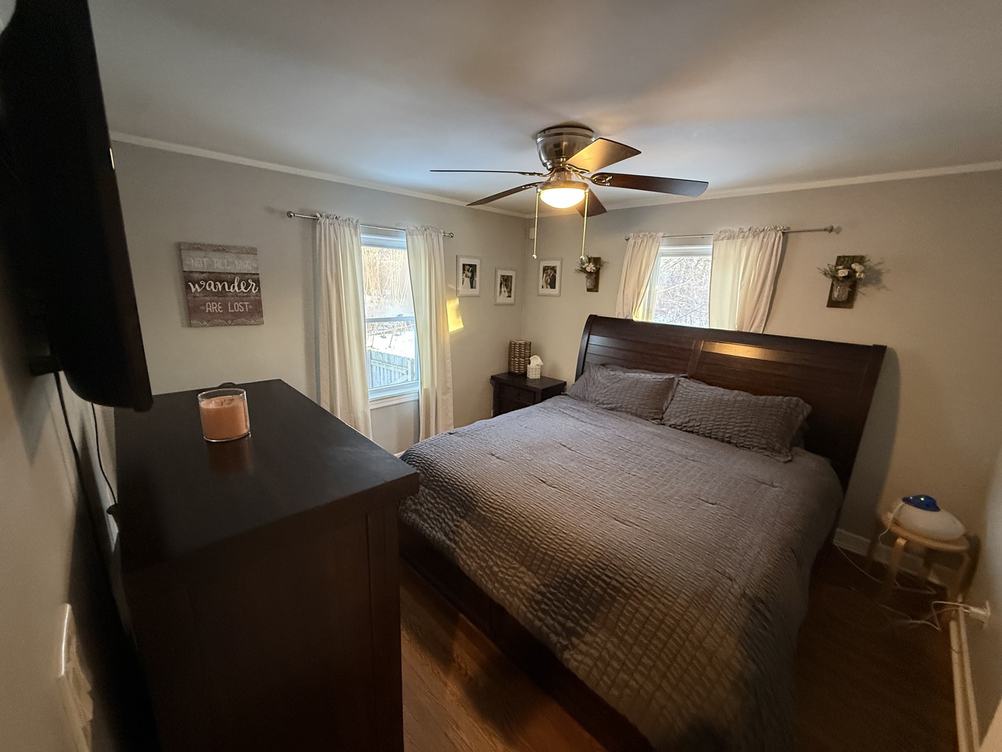 1044 Ellsworth Avenue Addison, IL 60101 - Photo 23 of 45 a bedroom with a bed and a chandelier