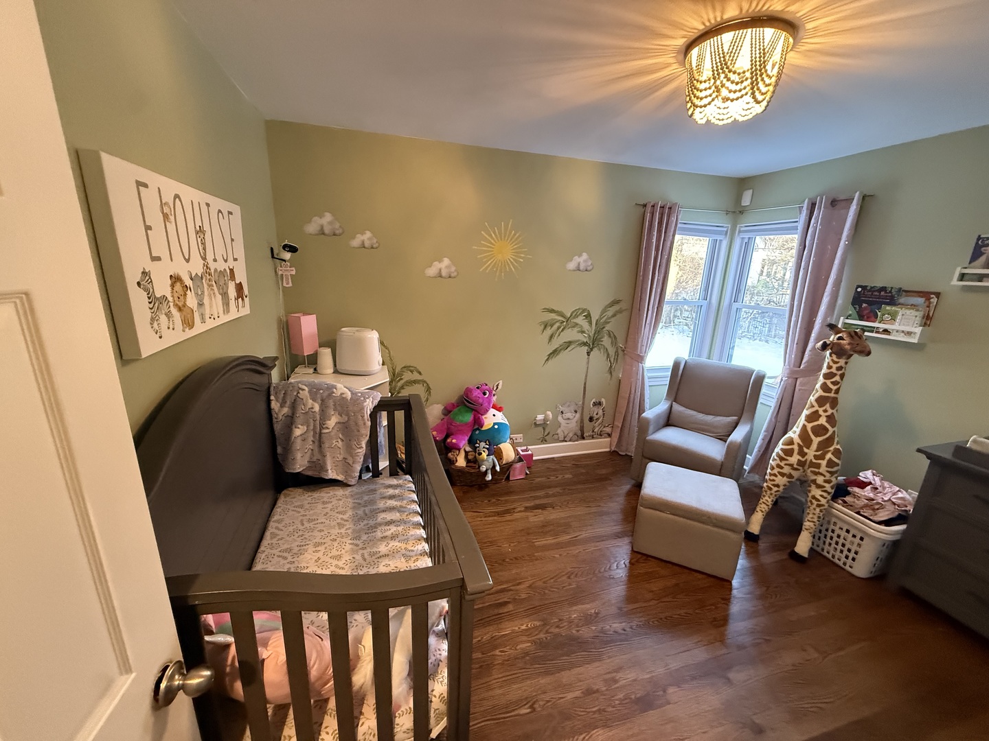 1044 Ellsworth Avenue Addison, IL 60101 - Photo 30 of 45 a living room with furniture and a table