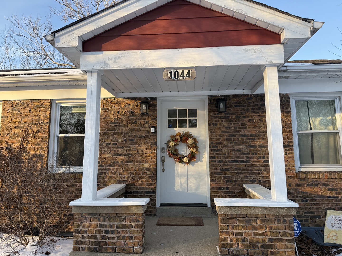 1044 Ellsworth Avenue Addison, IL 60101 - Photo 3 of 45 a front view of a building with outdoor seating