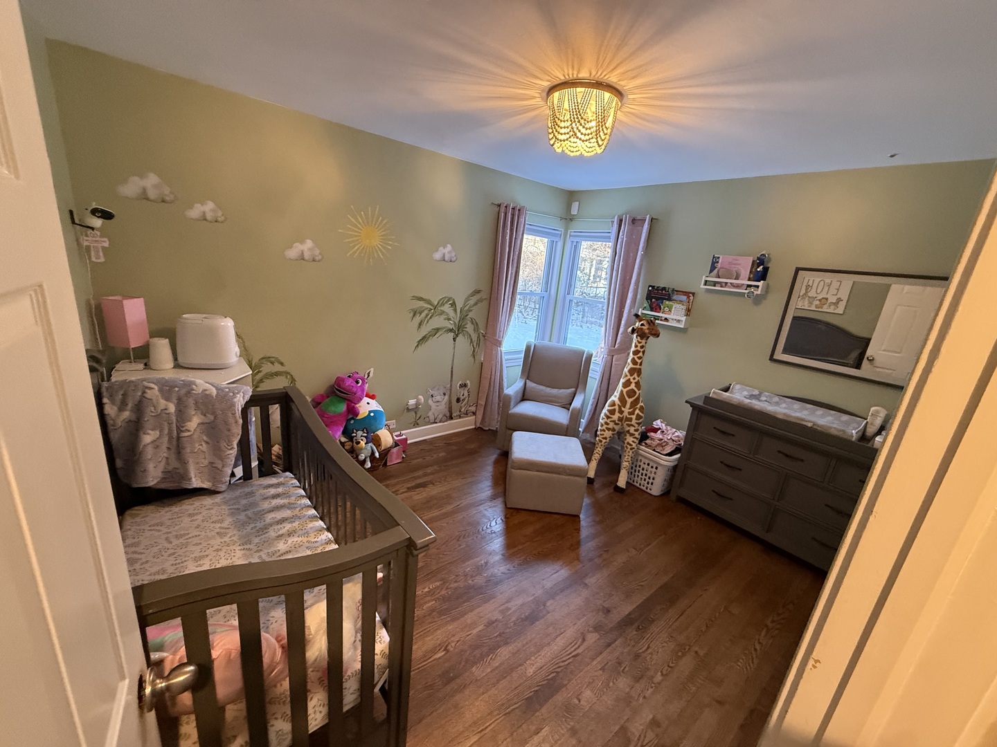 1044 Ellsworth Avenue Addison, IL 60101 - Photo 31 of 45 a living room with furniture and a flat screen tv