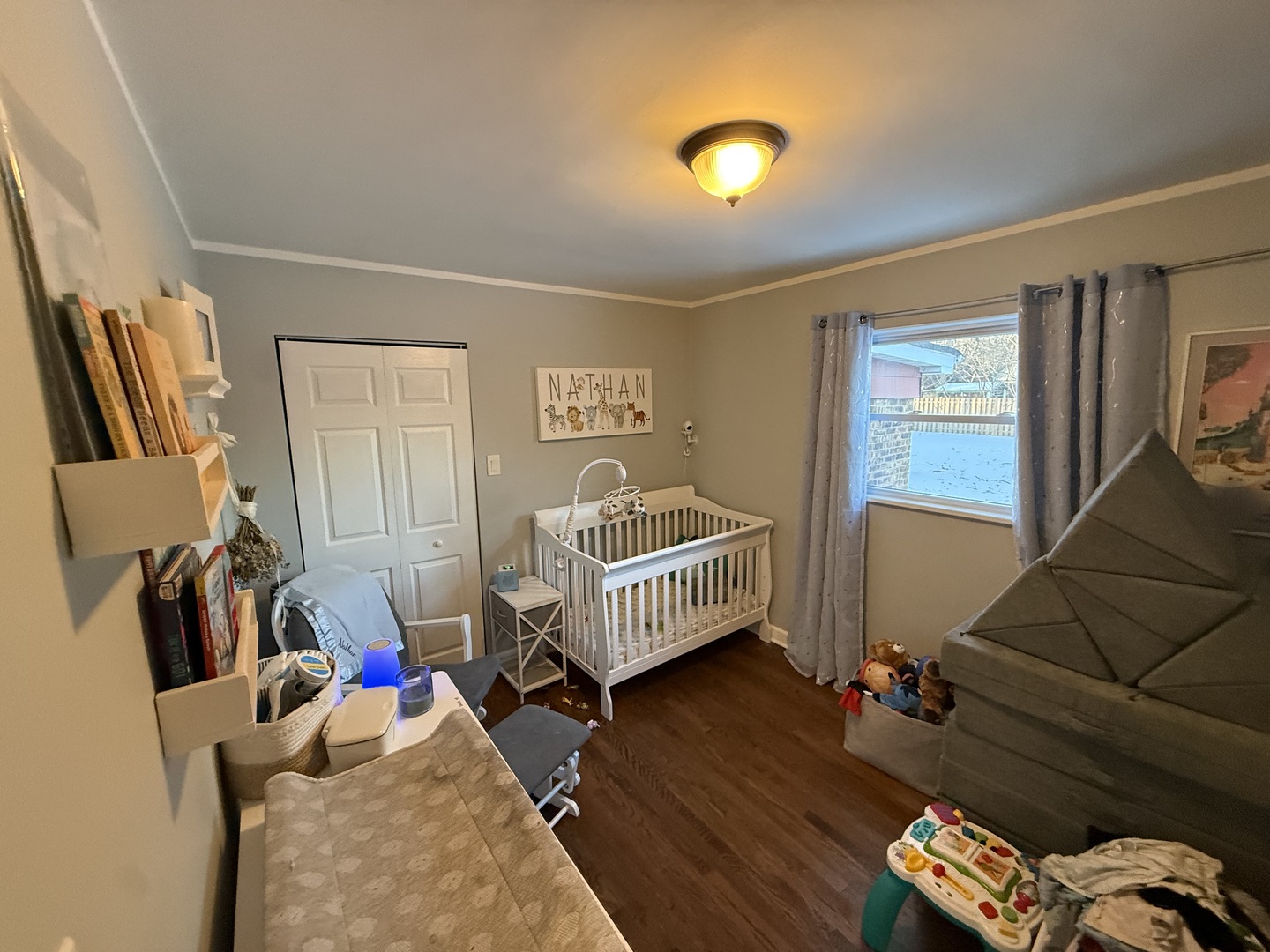 1044 Ellsworth Avenue Addison, IL 60101 - Photo 32 of 45 a bedroom with furniture and a window