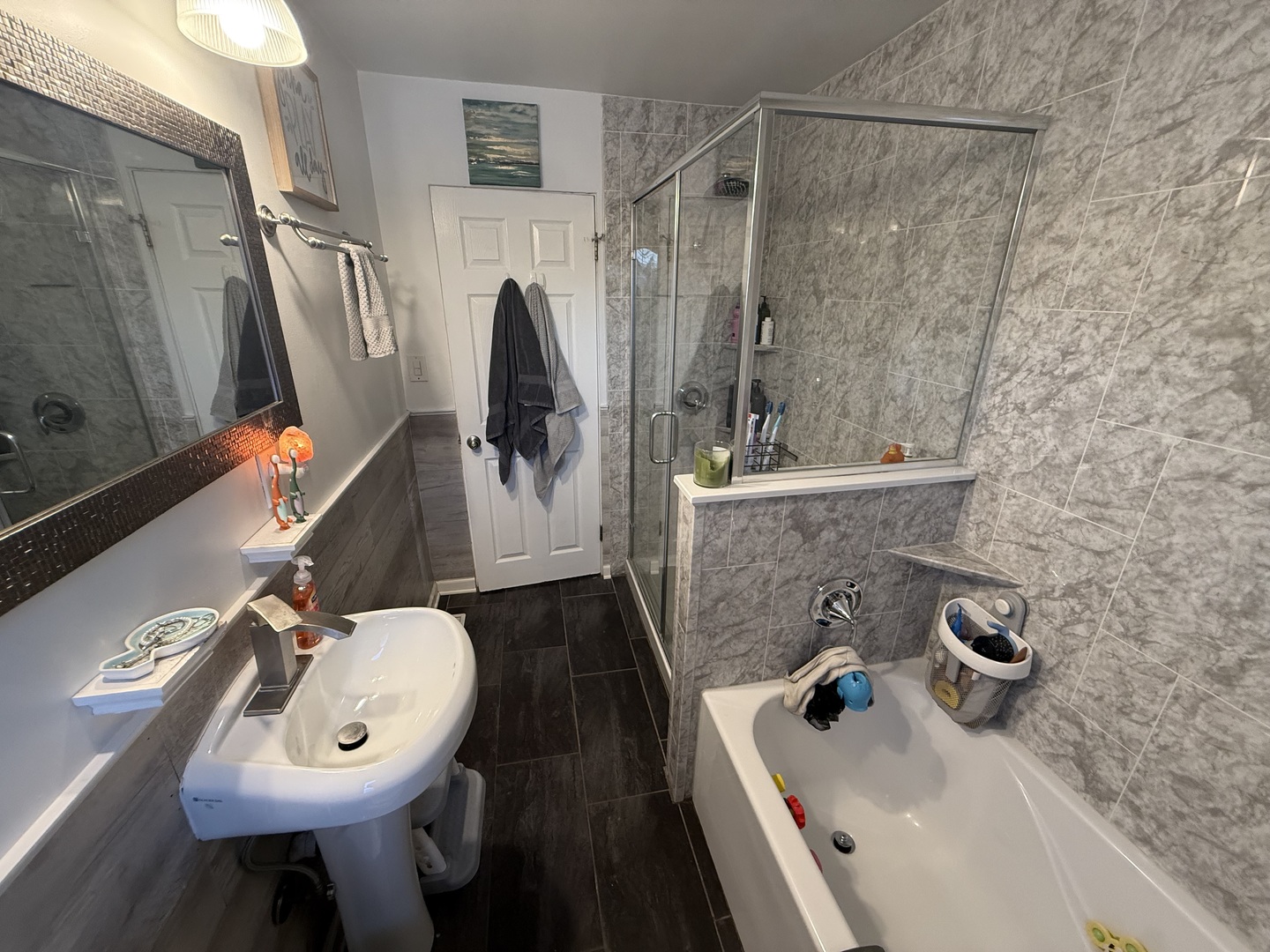 1044 Ellsworth Avenue Addison, IL 60101 - Photo 34 of 45 a bathroom with a sink a toilet and shower