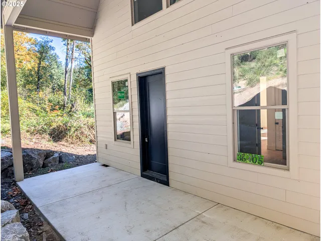 a front view of a house with a porch