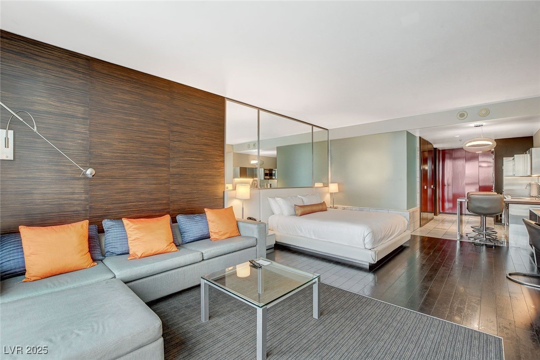 4381 West Flamingo Road, Unit 2204 Las Vegas, NV 89103 - Photo 10 of 27 Bedroom featuring hardwood / wood-style flooring