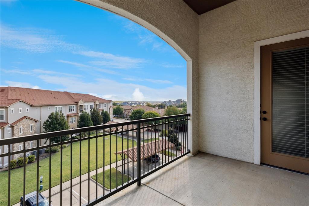 610 Via Ravello, Unit 410 Irving, TX 75039 - Photo 1 of 28 a view of balcony