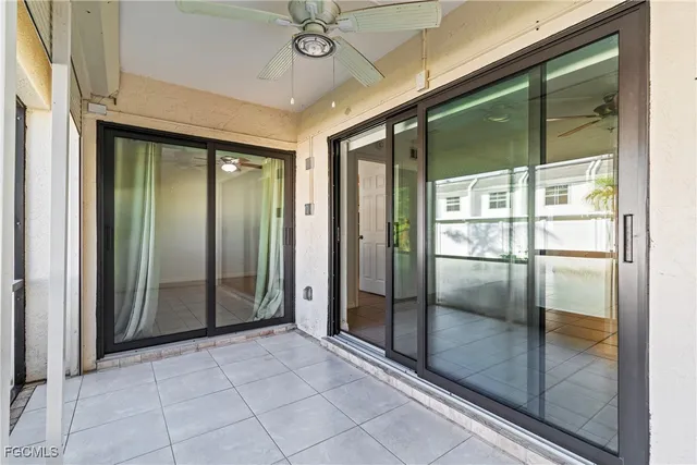 a view of a hallway with a glass door