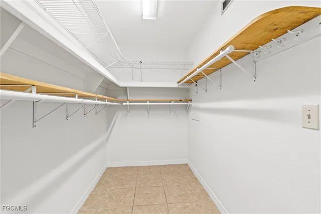 a view of a room with racks on the wall