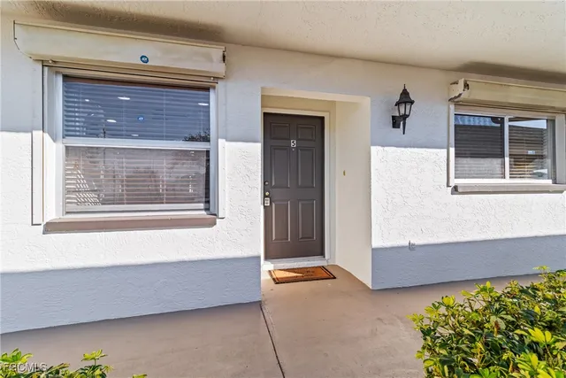 a living room with a large window