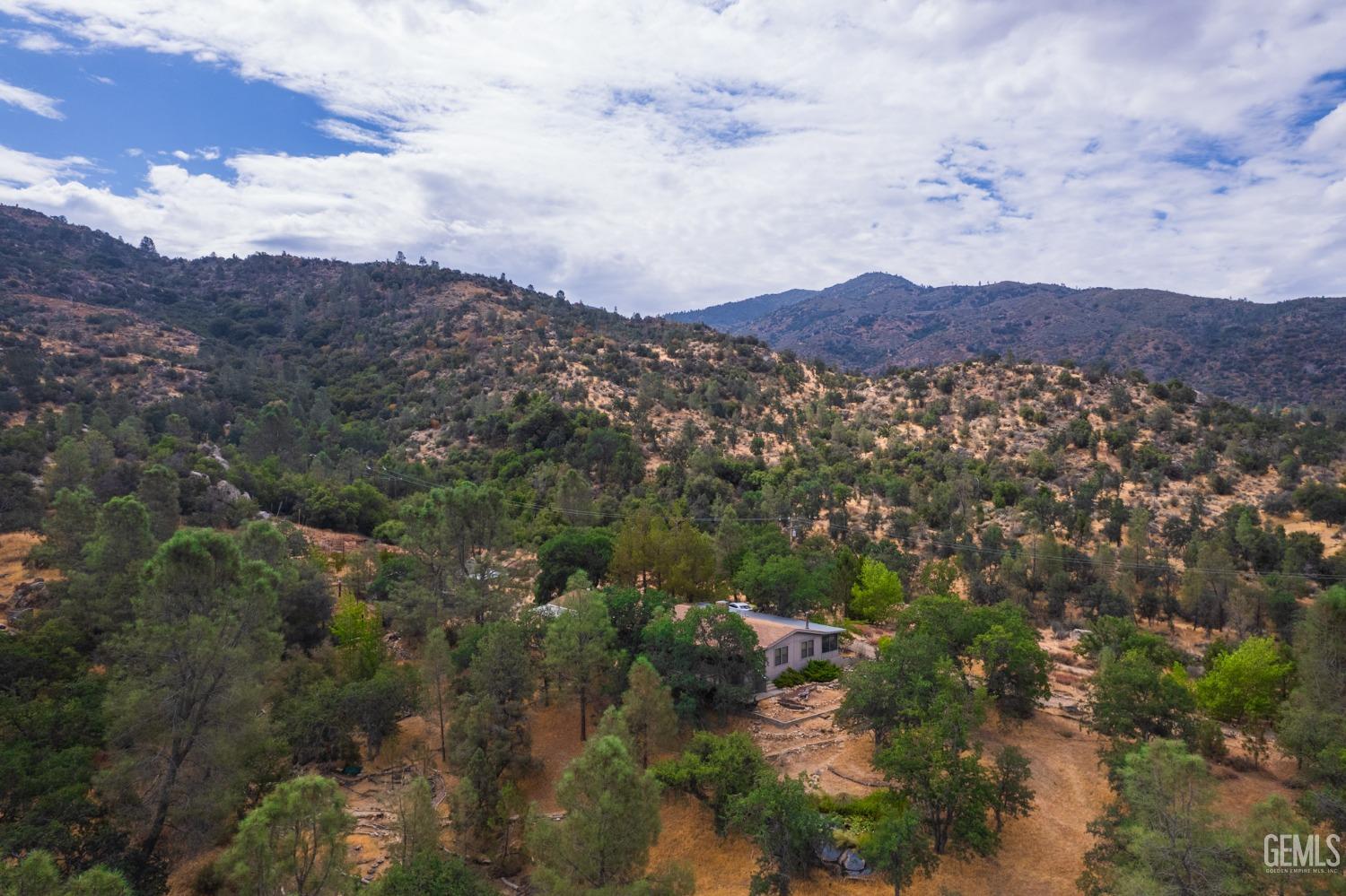 Undisclosed Address Caliente, CA 93518 - Photo 11 of 38 a view of a city with mountain