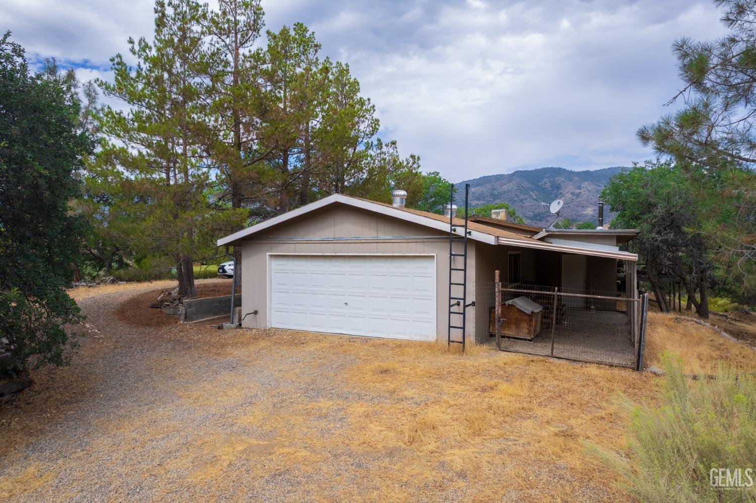 Undisclosed Address Caliente, CA 93518 - Photo 13 of 38 a view of house with outdoor space and sitting area