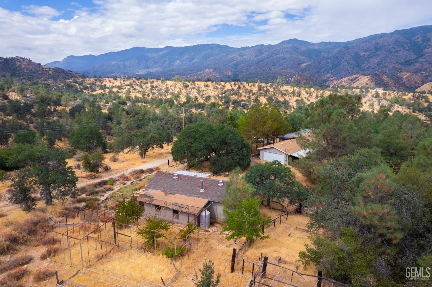 Undisclosed Address Caliente, CA 93518 - Photo 16 of 38 an aerial view of residential house and green space