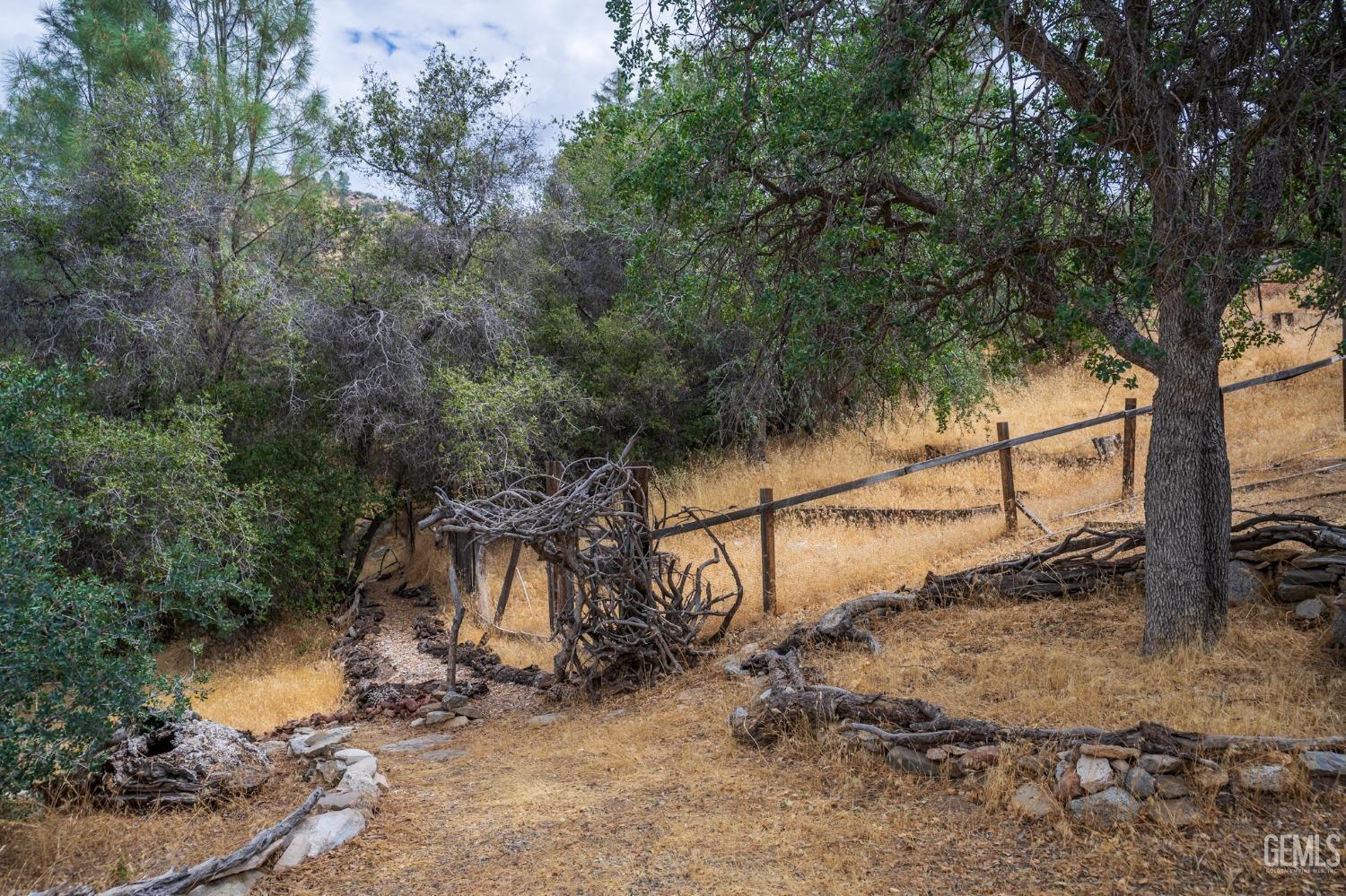 Undisclosed Address Caliente, CA 93518 - Photo 23 of 38 an empty room with trees