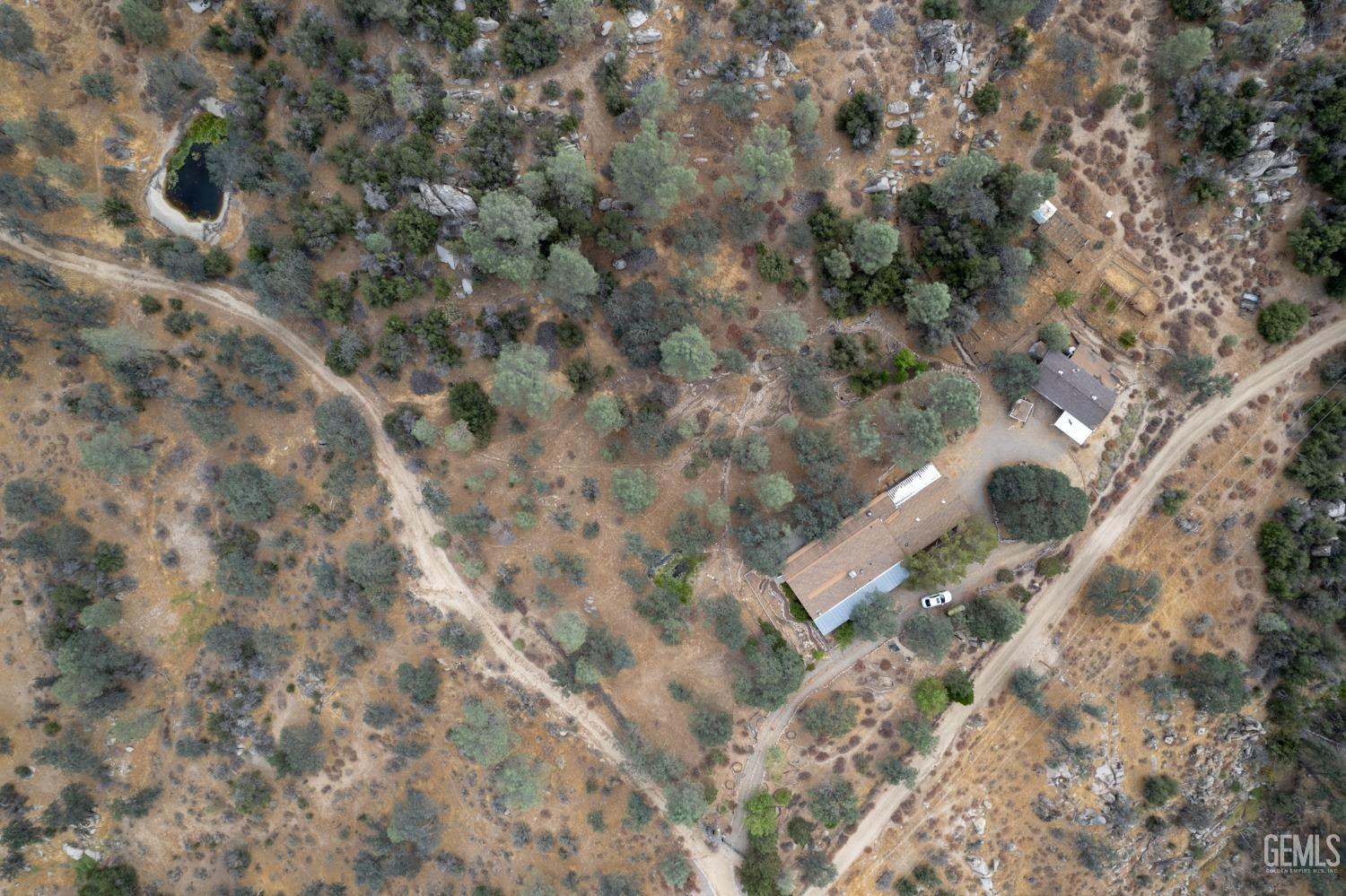 Undisclosed Address Caliente, CA 93518 - Photo 4 of 38 an aerial view of a residential houses with yard