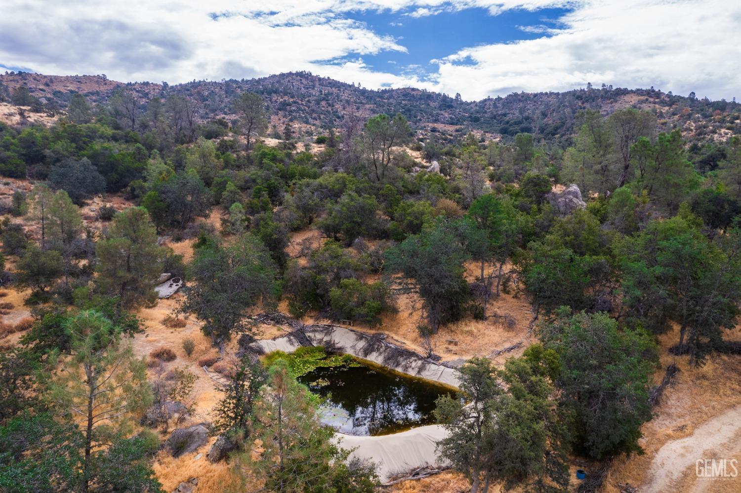 Undisclosed Address Caliente, CA 93518 - Photo 9 of 38 an aerial view of mountain and residential houses