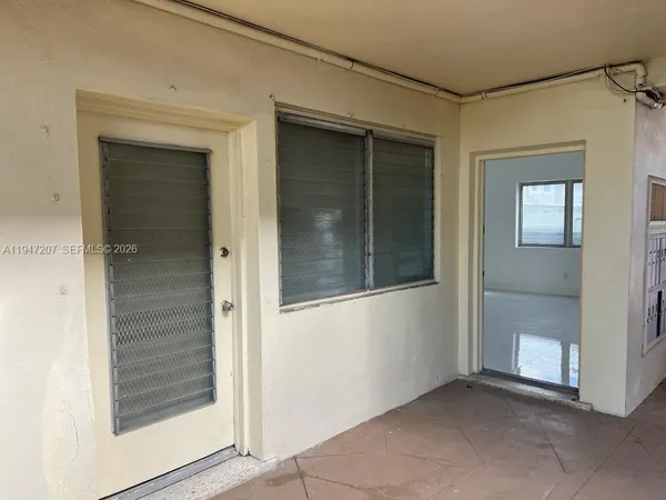 wooden floor and window in a room