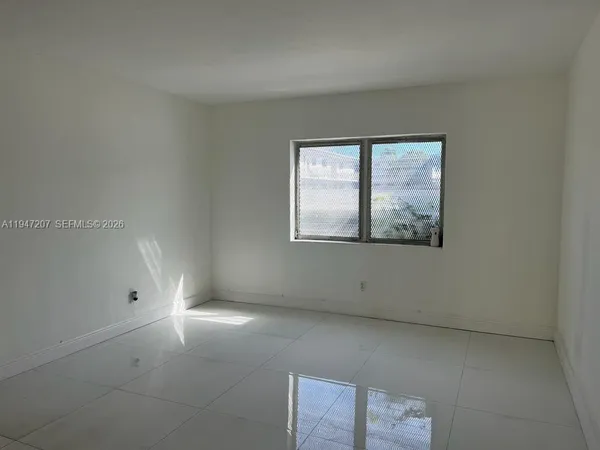 an empty room with a window