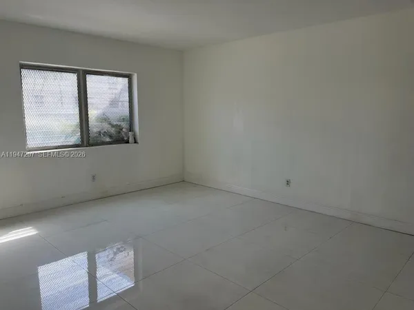 an empty room with a window