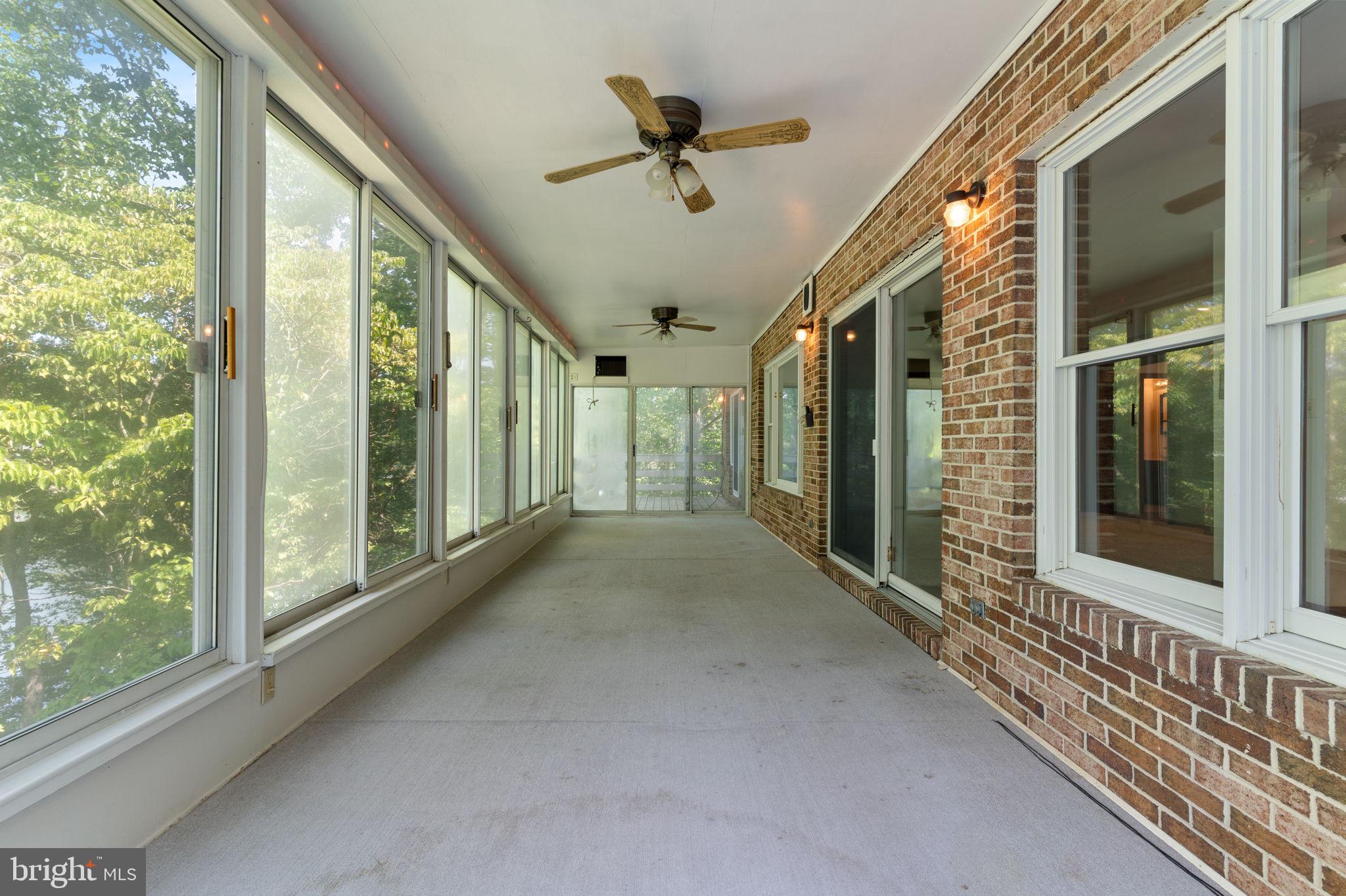44742 Three Coves Road Hollywood, MD 20636 - Photo 21 of 89 Panoramic sunroom