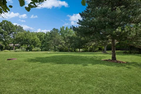 a view of building with green space