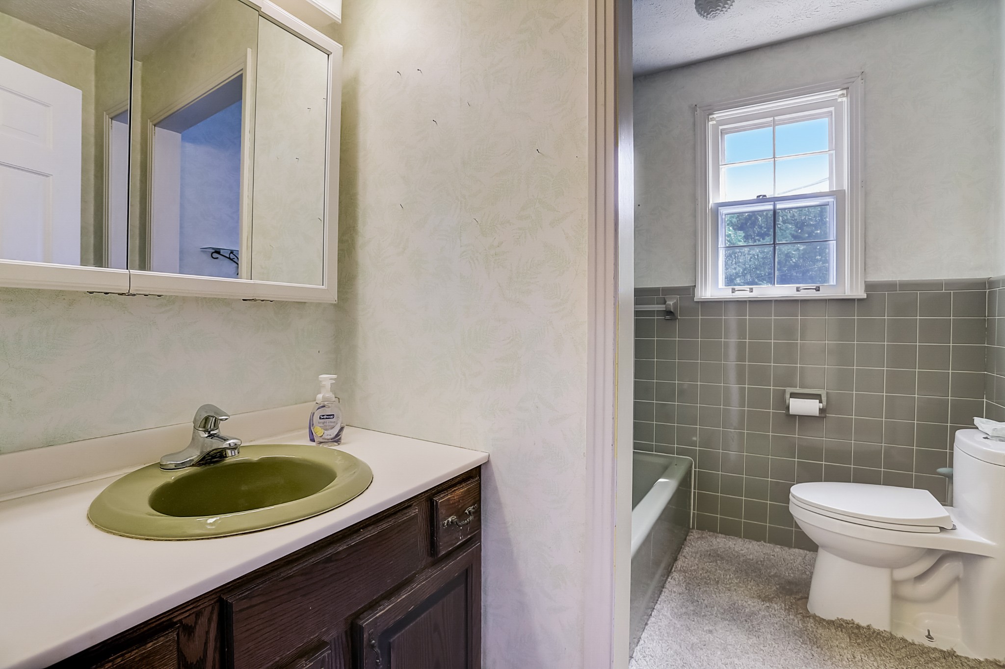 112 Lee Road Dickson, TN 37055 - Photo 11 of 29 a bathroom with a sink a toilet and a mirror