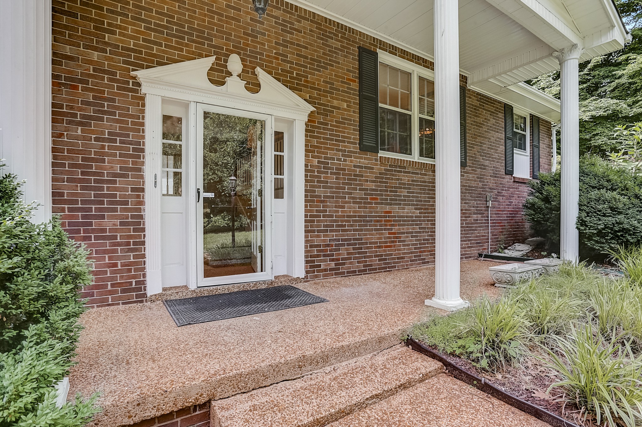 112 Lee Road Dickson, TN 37055 - Photo 2 of 29 a front view of a house with a porch