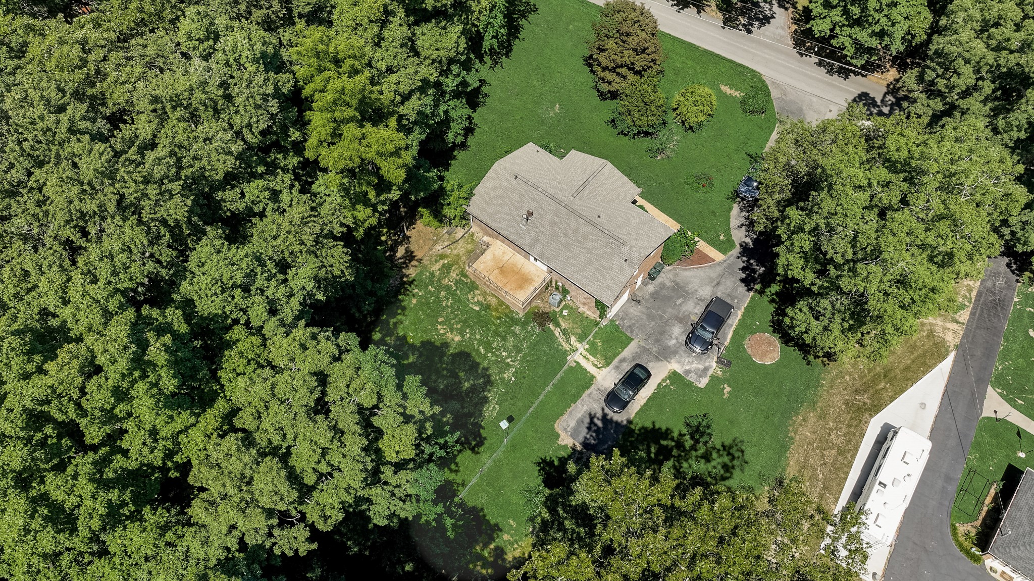 112 Lee Road Dickson, TN 37055 - Photo 26 of 29 an aerial view of a house with a yard and garden