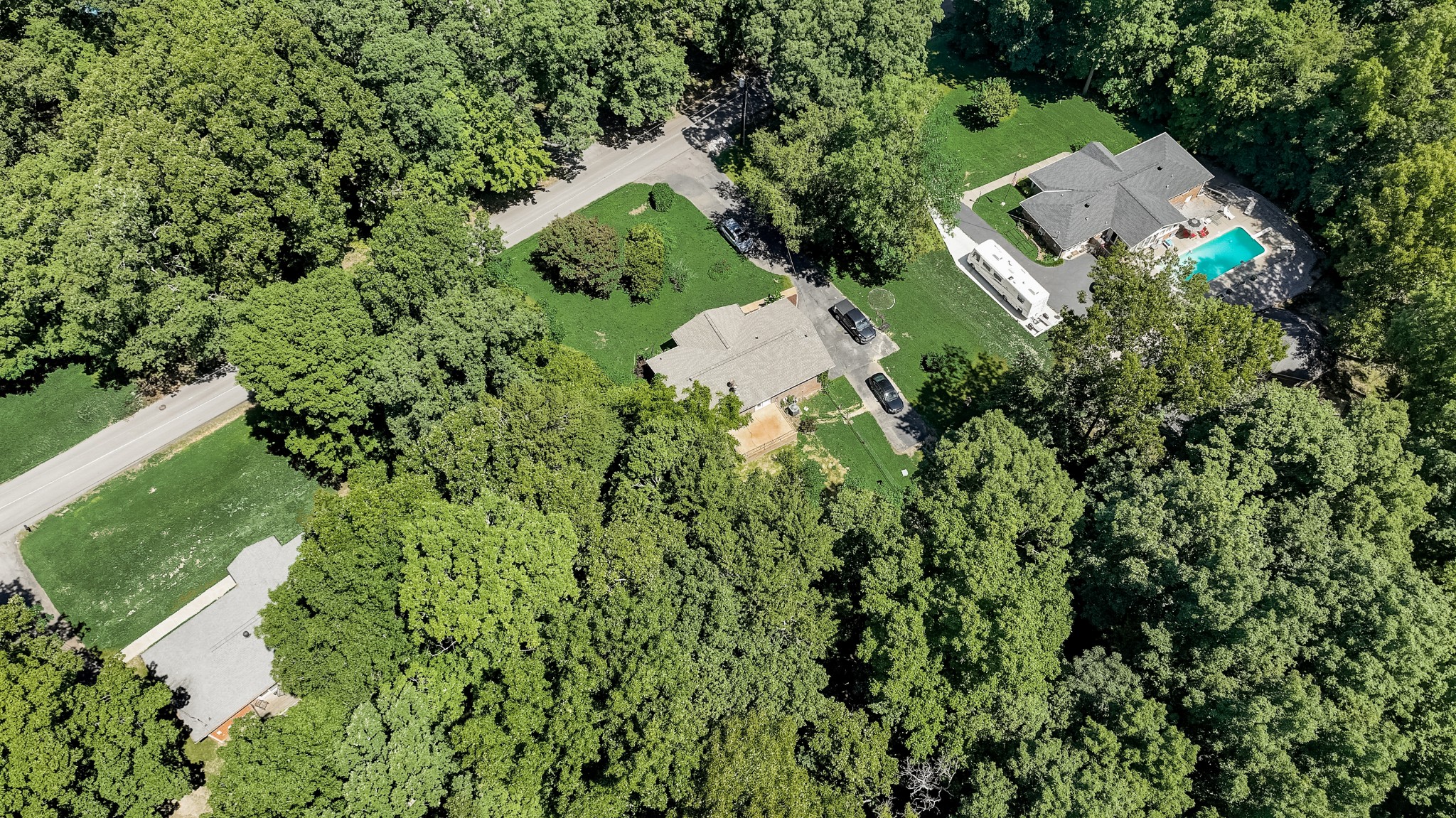 112 Lee Road Dickson, TN 37055 - Photo 27 of 29 an aerial view of a house with a yard and outdoor seating