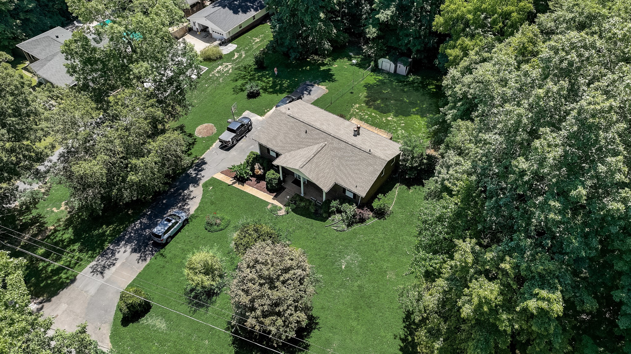 112 Lee Road Dickson, TN 37055 - Photo 28 of 29 an aerial view of a house with a yard