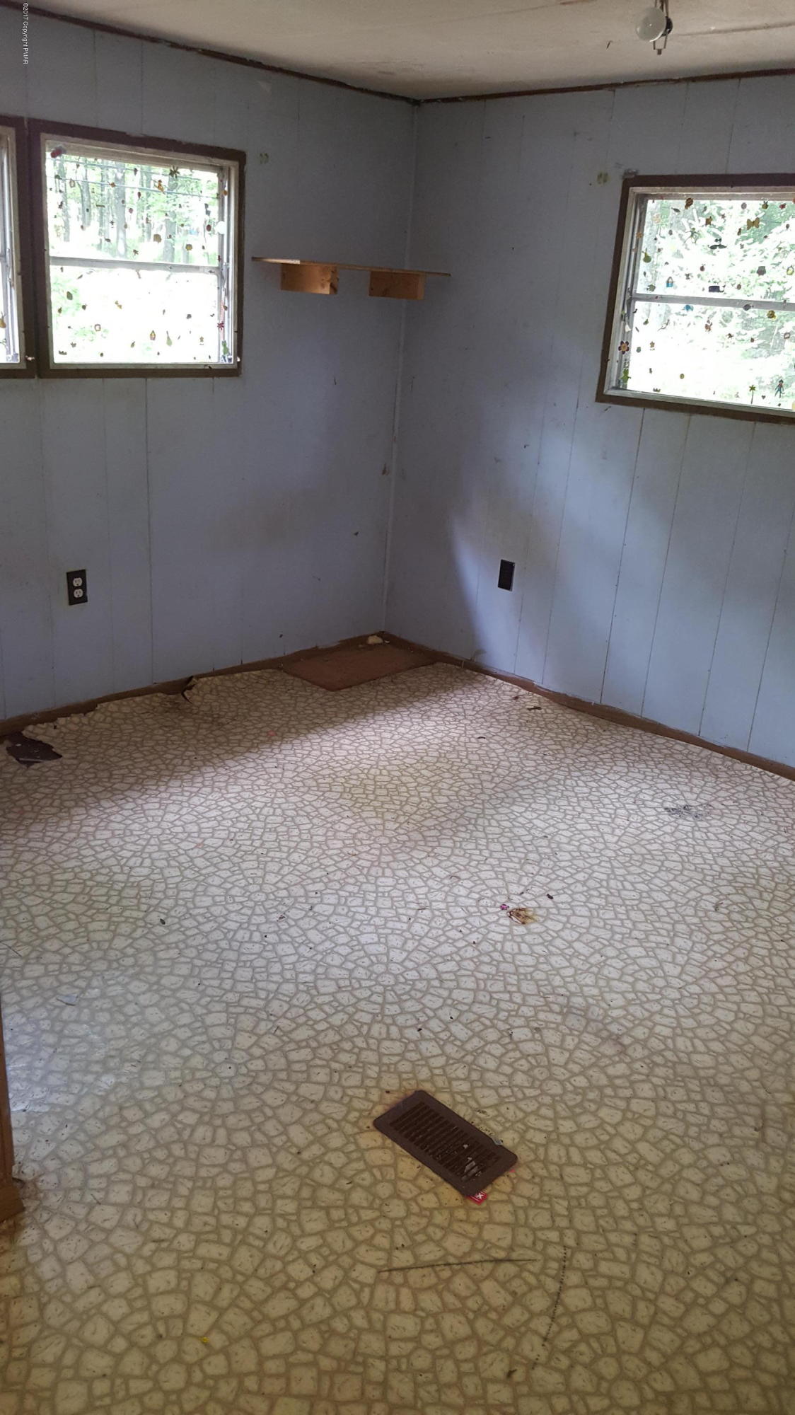 250 Nevin Road Newfoundland, PA 18445 - Photo 17 of 32 a view of an empty room with a window