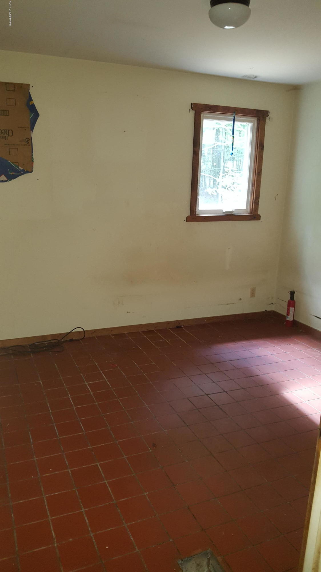 250 Nevin Road Newfoundland, PA 18445 - Photo 21 of 32 an empty room with a window