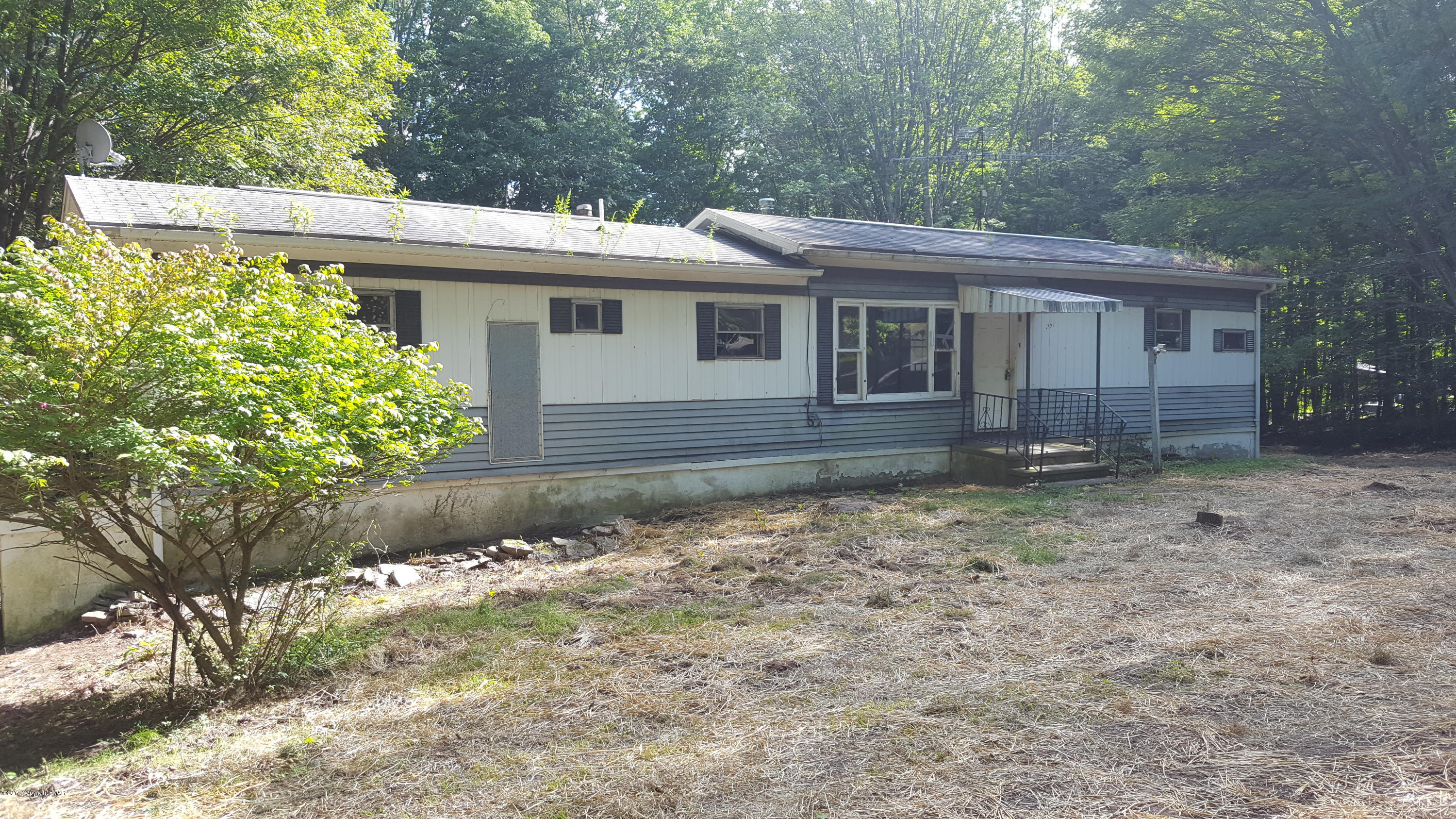 250 Nevin Road Newfoundland, PA 18445 - Photo 3 of 32 a view of a house with a yard