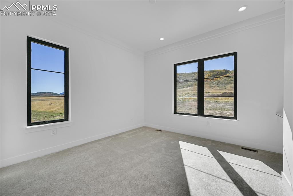5549 Remuda Ranch Parkway Sedalia, CO 80135 - Photo 15 of 39 a view of an empty room with a window