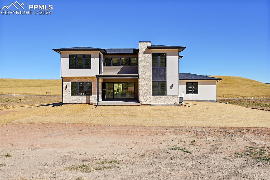 5549 Remuda Ranch Parkway Sedalia, CO 80135 - Photo 32 of 39 a view of an house with beach