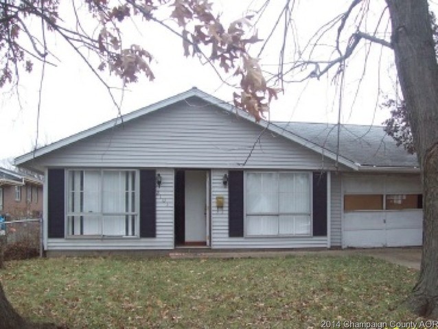 2101 East Eleanor Avenue Springfield, IL 62702 - Photo 1 of 1 a front view of a house with a garden and yard