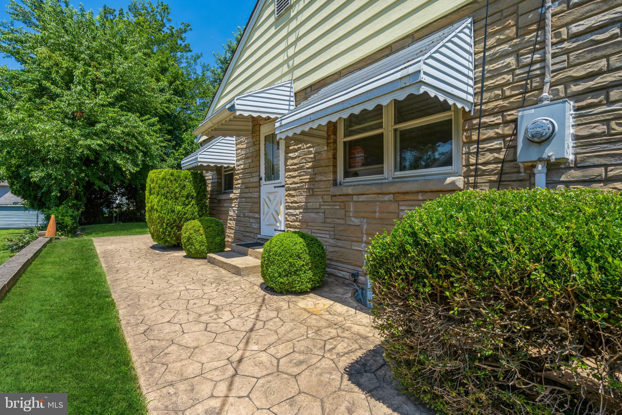 112 Wilburtha Road Ewing, NJ 08628 - Photo 14 of 21 a front view of a house with garden