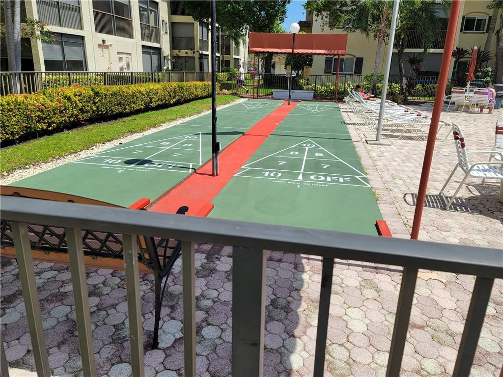 251 South Cypress Road, Unit 112 Pompano Beach, FL 33060 - Photo 13 of 20 a view of outdoor space yard and patio