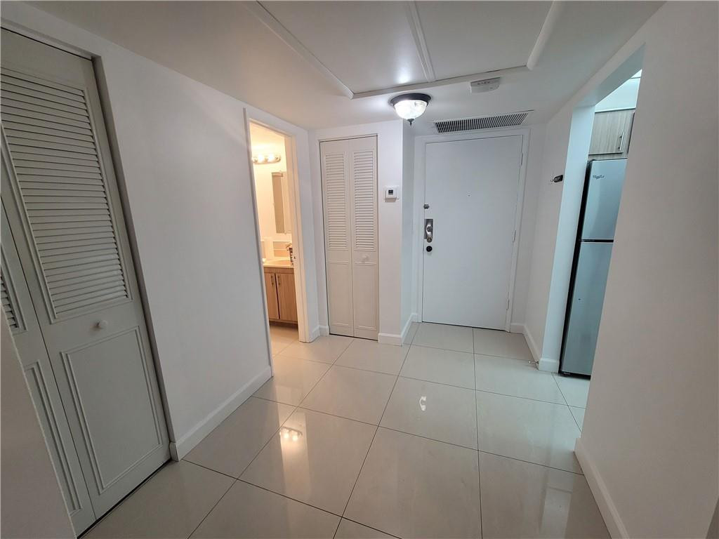 251 South Cypress Road, Unit 112 Pompano Beach, FL 33060 - Photo 8 of 20 a view of an empty room