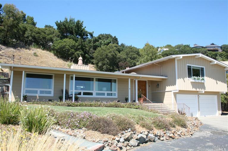 41 Dunfries Terrace San Rafael, CA 94901 - Photo 1 of 1 Street view of house. Living room is on the right, Dining room is on the left and the Master is above the garage. Front of house has water and Bridge views.