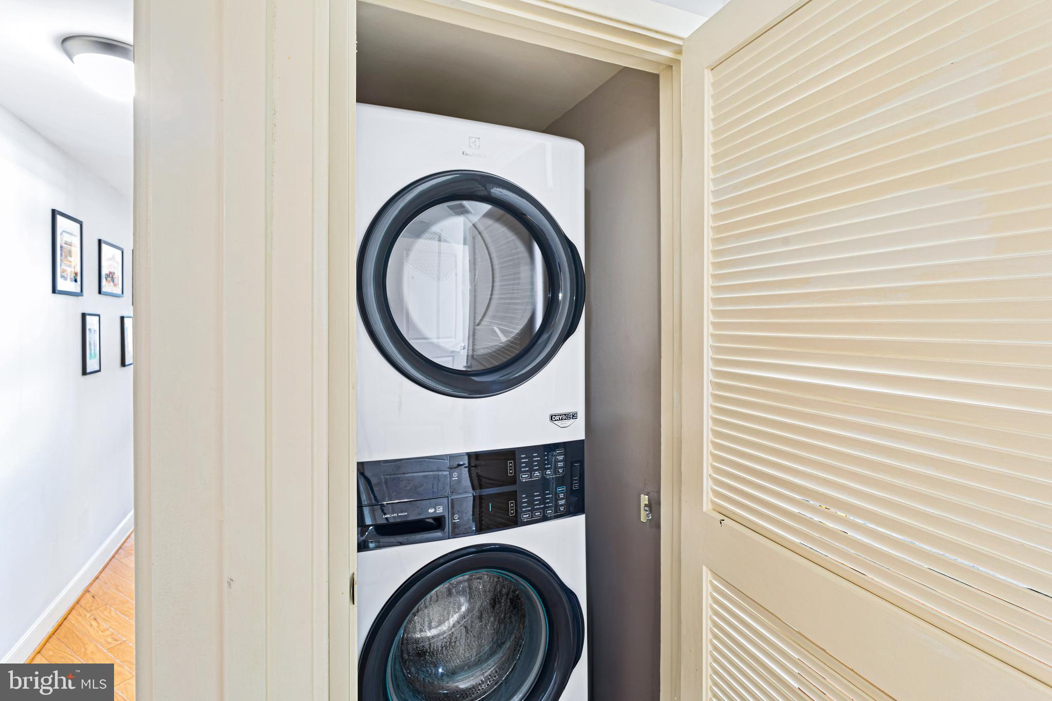 1117 10th Street Northwest, Unit 804 Washington, DC 20001 - Photo 35 of 46 a close view of a utility room with dryer and washer