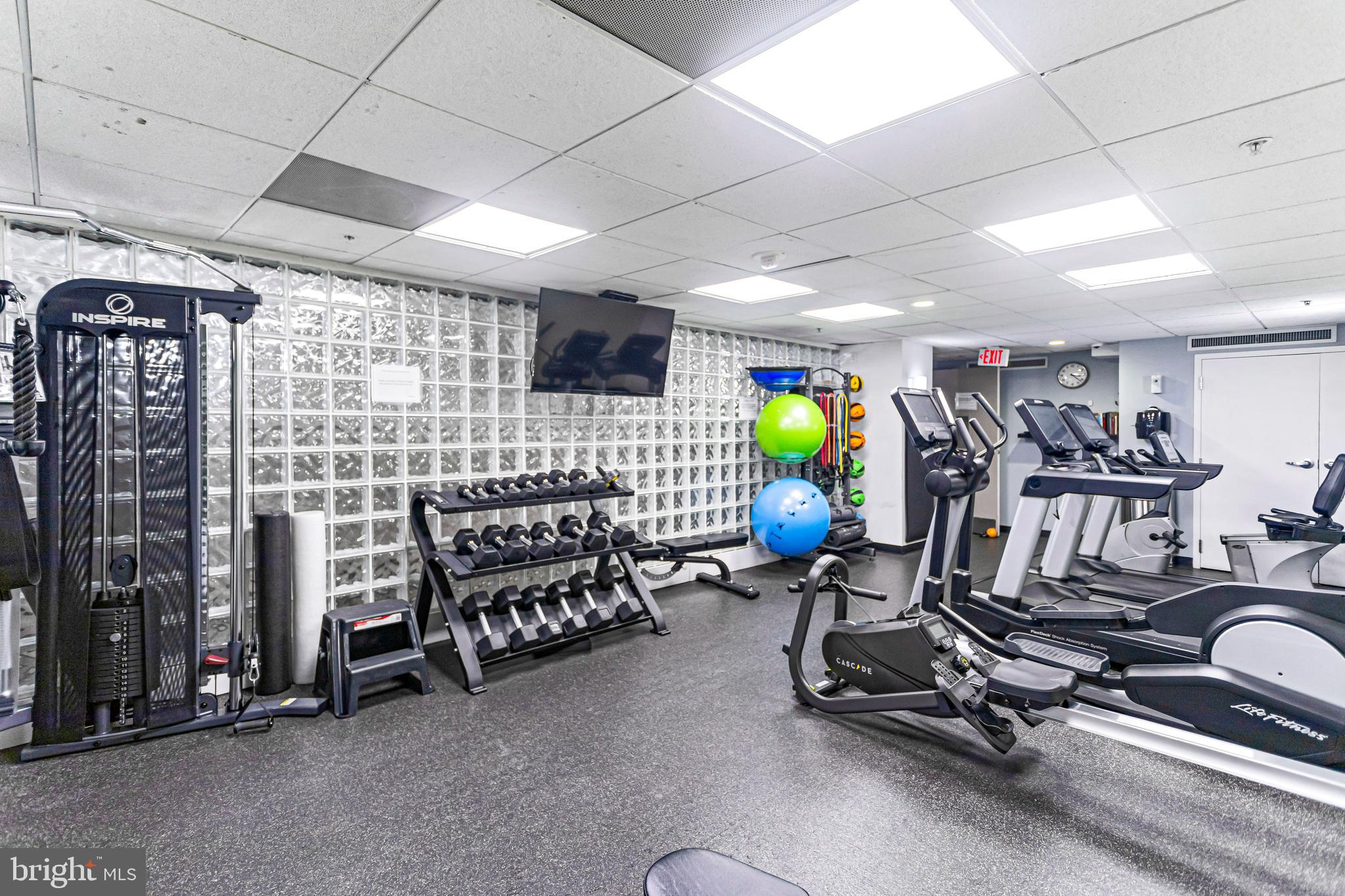 1117 10th Street Northwest, Unit 804 Washington, DC 20001 - Photo 43 of 46 a view of a room with gym equipment