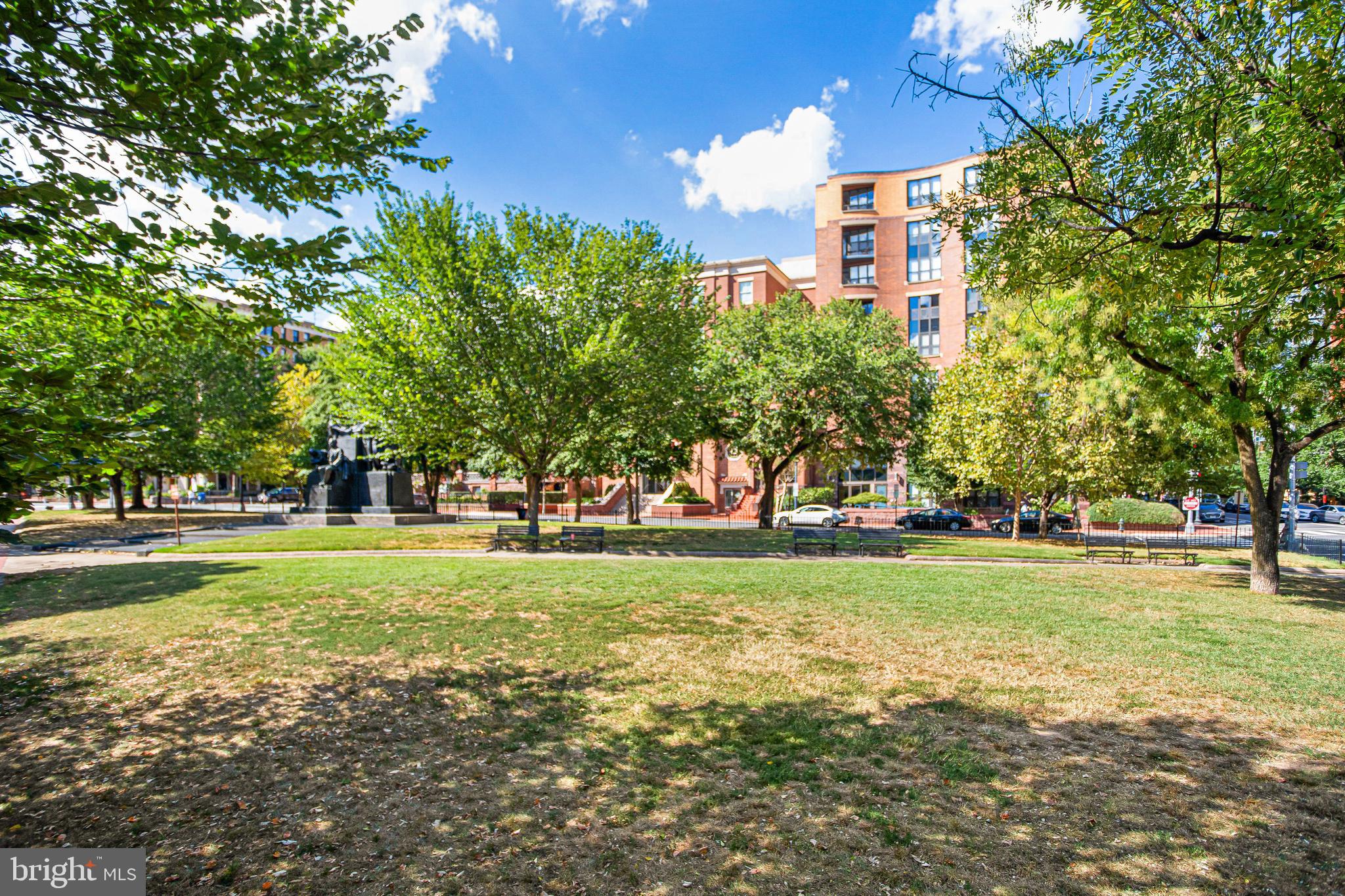1117 10th Street Northwest, Unit 804 Washington, DC 20001 - Photo 46 of 46 a view of a trees in a yard with a house