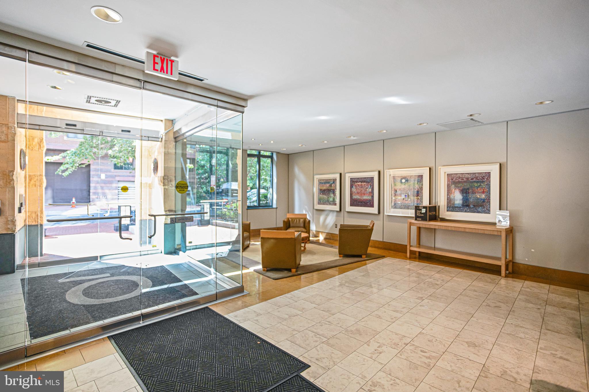 1117 10th Street Northwest, Unit 804 Washington, DC 20001 - Photo 5 of 46 a living room with furniture and a table
