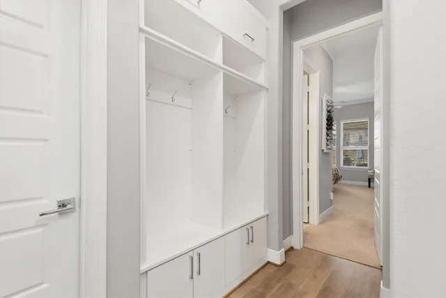 a view of a bathroom from a hallway