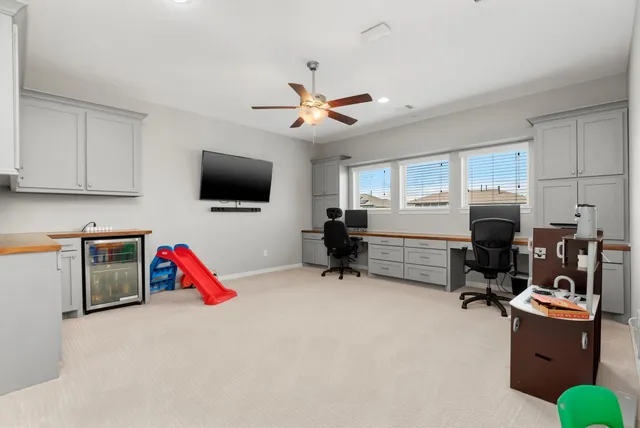 a room with furniture and a flat screen tv